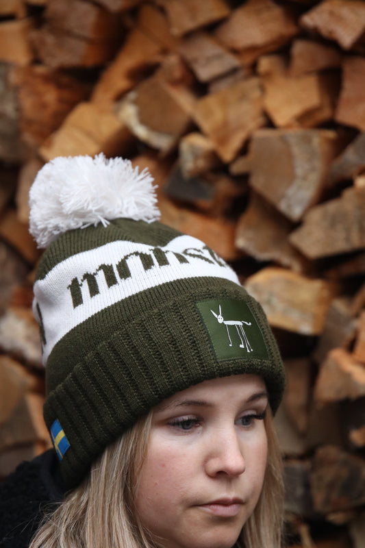 Stickad mössa med tofs Monster Green